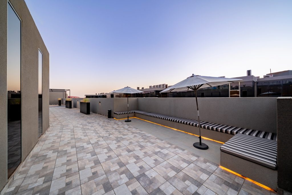 Terrace view of R House coworking space overlooking Riyadh skyline