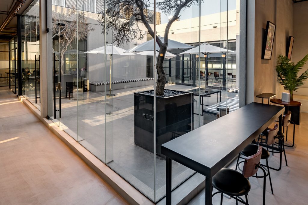 Open-plan coworking space in Riyadh with modern furniture and community vibe